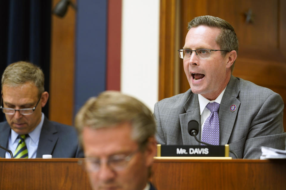 FILE - Rep. Rodney Davis, R-Ill., right, speaks during a House Committee on Transportation and Infrastructure on Capitol Hill in Washington, May 18, 2022. Davis was drawn out of the 13th District he represented for a decade and placed in the heavily Republican 15th District. He lost in a GOP primary to Rep. Mary Miller in 2022, who was endorsed by former President Donald Trump. The reshaped 13th District was won by Democrat Nikki Budzinski, a former aide to Pritzker and President Joe Biden. (AP Photo/Mariam Zuhaib, File)