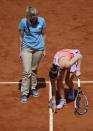 Lucie Safarova of the Czech Republic argues with a referee during her women's quarter-final match against Garbine Muguruza of Spain during the French Open tennis tournament at the Roland Garros stadium in Paris, France, June 2, 2015. REUTERS/Vincent Kessler