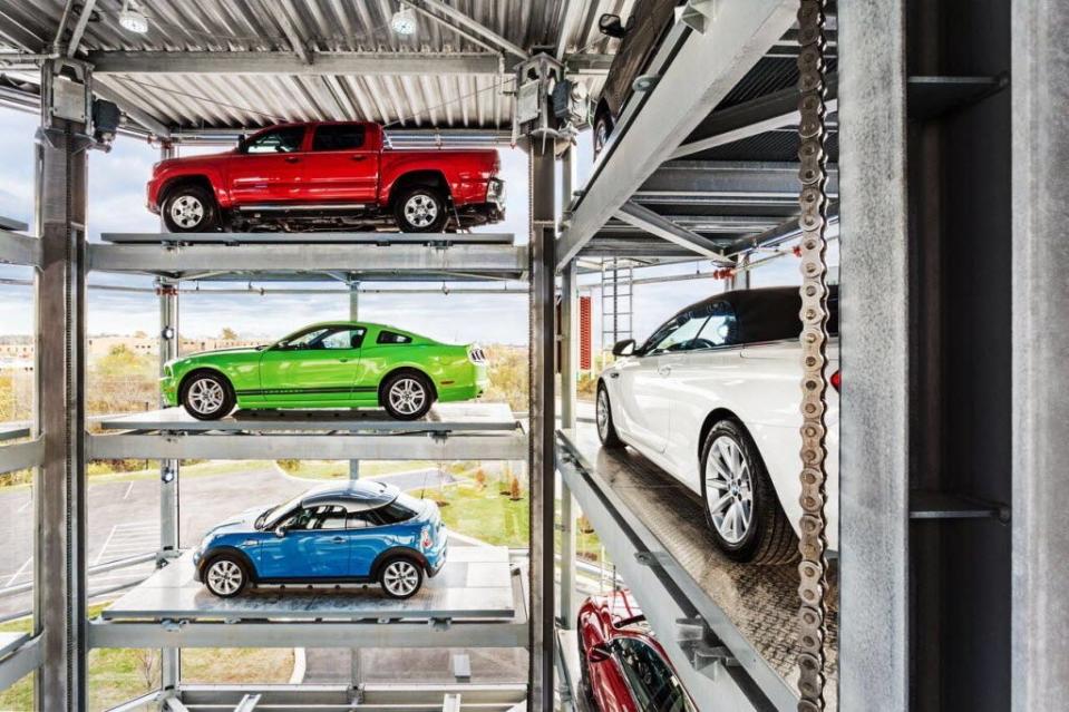 Carvana used cars sit inside one of the company's vending machines in Nashville.