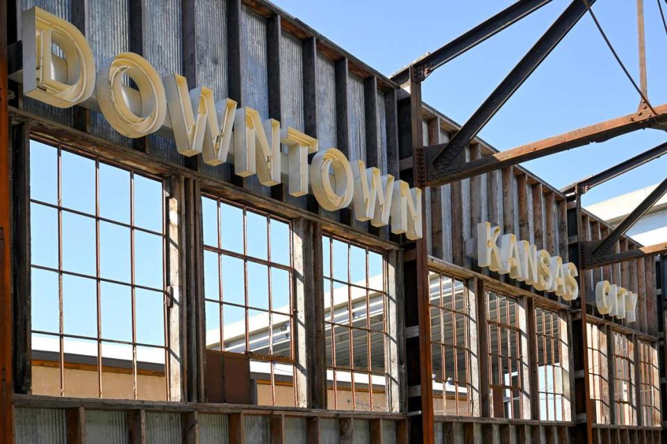 A blue neon sign from what was once called the Kansas City Downtown Airport is mounted atop what will be the Tailgate Beer Garden building at Pennway Point.