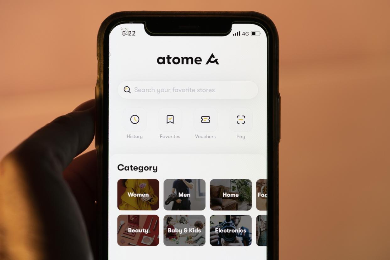 Atome, a buy now pay later (BNPL) app, is displayed on an iPhone in Singapore, on Sunday, June 6, 2021. (Wei Leng Tay/Bloomberg)