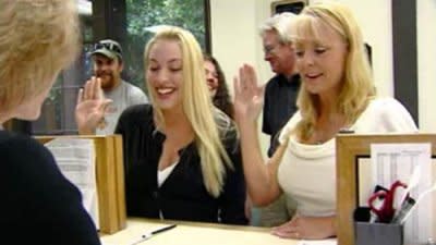 Sarah Brown with groom Randall Blake's mother saying 'I do' over the phone. (Photo: KCRA/CNN)