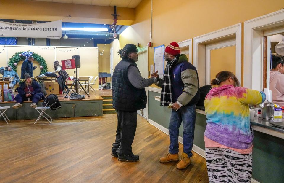 Noel Dandy greets a friend at Mathewson Street United Methodist Church, where supporters worked for months to secure his release from the Rhode Island State Psychiatric Hospital.