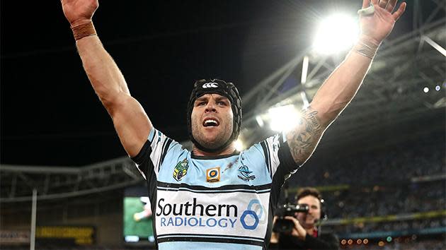 Retiring hooker Michael Ennis celebrates.