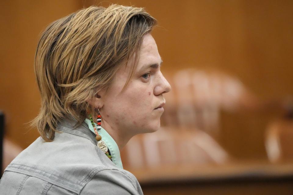 Karissa Bowley, wife of the late Dau Mabil, a 33-year-old Jackson, Miss., resident who went missing on March 25 and whose body was found in April floating in the Pearl River in Lawrence County, waits for questioning to resume during a hearing, Tuesday, April 30, 2024 in Jackson, Miss. The hearing is on whether a judge should dissolve or modify his injunction preventing the release of Mabil's remains until an independent autopsy could be conducted. (AP Photo/Rogelio V. Solis)