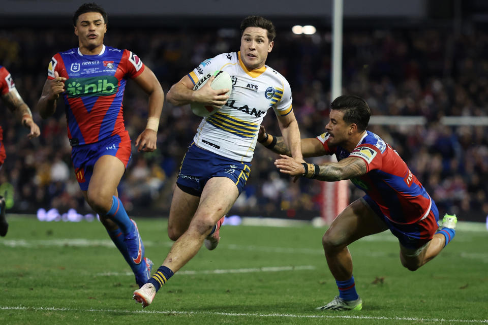 NEWCASTLE, AUSTRALIA - JUNE 29: Mitchell Moses of the Eels runs with the ball during the round 17 NRL match between Newcastle Knights and Parramatta Eels at McDonald Jones Stadium, on June 29, 2024, in Newcastle, Australia. (Photo by Scott Gardiner/Getty Images)