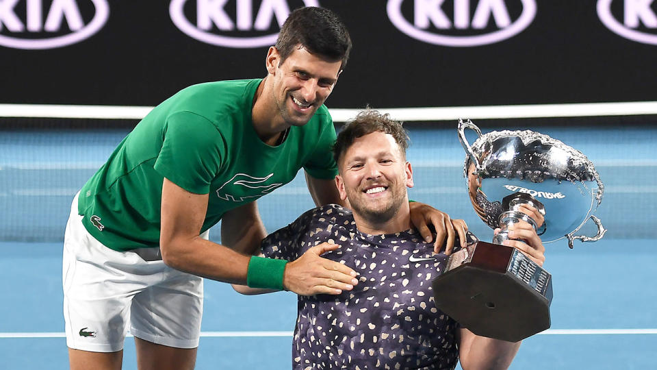 Seen here, 2020 Australian Open champions Dylan Alcott and Novak Djokovic.