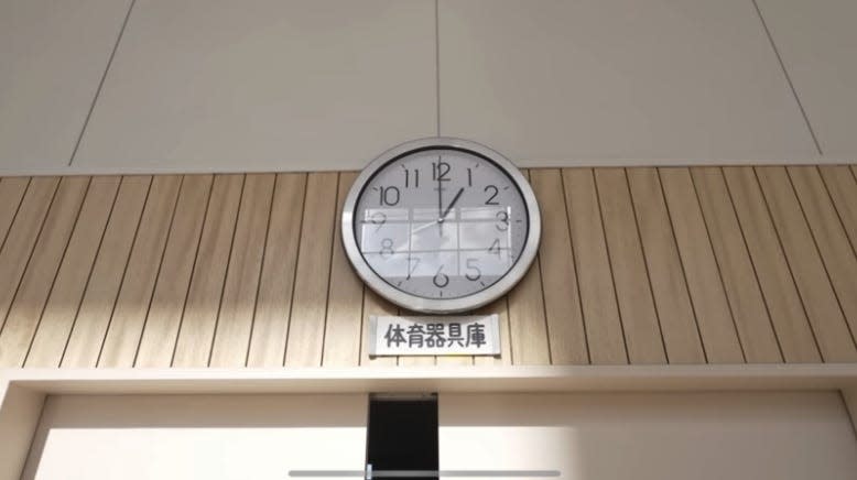 Clock showing the time 1 o'clock in an abandoned Fukushima hospital.