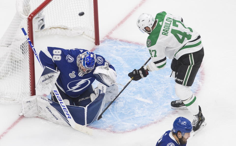 Dallas Stars right wing Alexander Radulov (47) is stopped by Tampa Bay Lightning goaltender Andrei Vasilevskiy (88) during second-period NHL Stanley Cup finals hockey action in Edmonton, Alberta, Saturday, Sept. 19, 2020. (Jason Franson/The Canadian Press via AP)