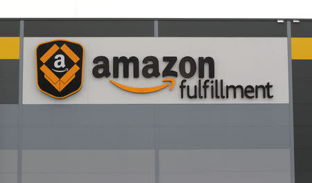 FILE PHOTO: A logo of the Amazon fulfillment is seen outside the Amazon fulfillment center in the village of Dobroviz, near Prague, Czech Republic, December 20, 2018.REUTERS/David W Cerny/File Photo