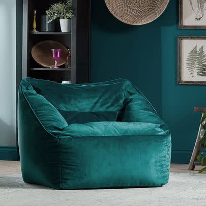 I'm slightly obsessed with this green velvet bean bag chair that's 21% off