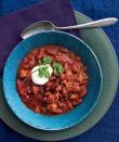 <p>For a lighter take on chili, ground turkey is the star of the show in this favorite recipe. Ground chipotle adds a touch of smokiness, keeping this bowl of chili bold and rich just like the others in our top picks.</p> <p><strong>Get the recipe:</strong> <a rel="nofollow noopener" href="https://www.realsimple.com/food-recipes/browse-all-recipes/turkey-bean-chili" target="_blank" data-ylk="slk:Turkey and Bean Chili;elm:context_link;itc:0;sec:content-canvas" class="link ">Turkey and Bean Chili</a></p>