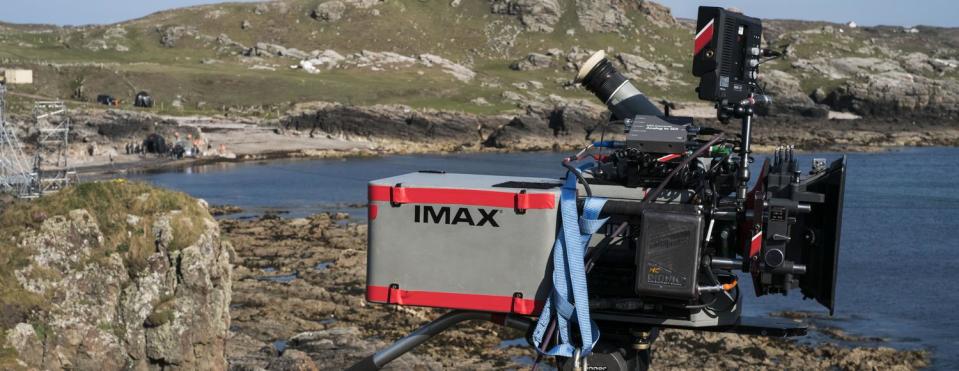 An IMAX laser camera filming in a rocky location.