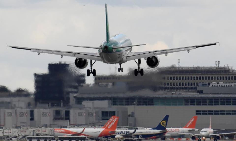 A passenger aircraft lands at Gatwick.