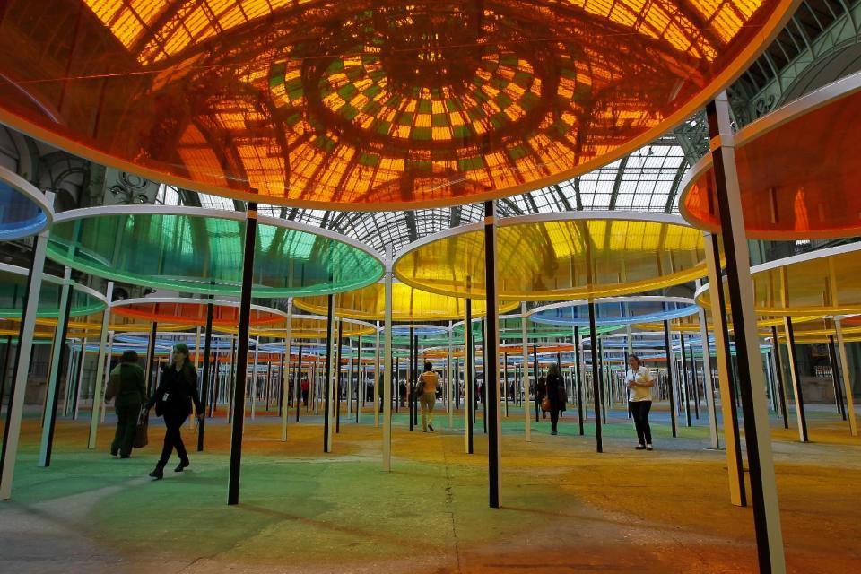 View of the creation of contemporary artist Daniel Buren in the Grand Palais during the opening of ground-breaking Monumenta exhibit in Paris, Wednesday May 9, 2012. Monumenta, the hugely-popular annual installation project that's in its fifth year, dares an artist of international stature to "move into" the nave of one of the French capital's most monumental buildings, and own it. (AP Photo/Francois Mori)