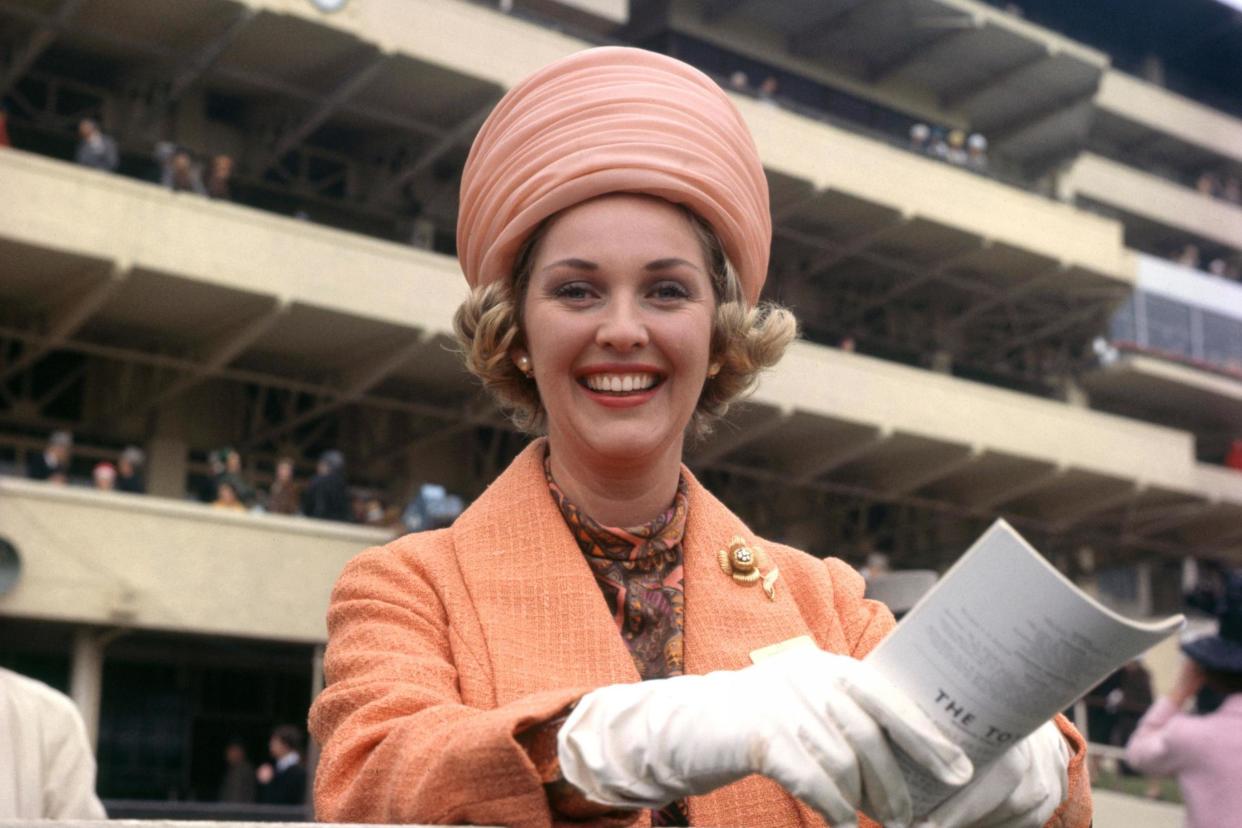 Actress Katie Boyle pictured at Epsom Racecourse in 1963: PA