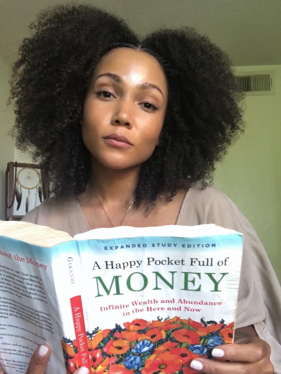 "This book is like a cheat code to manifesting your reality. Say it with me, ‘I am wealth. I am abundance. I am joy.’ 10/10 highly recommend."