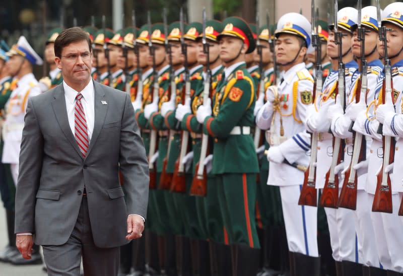 U.S. Defense Secretary Mark Esper reviews the Vietnamese guard of honour during a welcoming ceremony in Hanoi