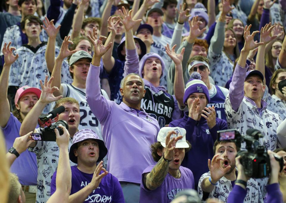 Kansas State basketball coach Jerome Tang celebrates in the student section after a Feb. 18 victory over Iowa State at Bramlage Coliseum.