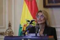 Bolivian Interim President Jeanine Anez reads a statement at the Presidential Palace, in La Paz