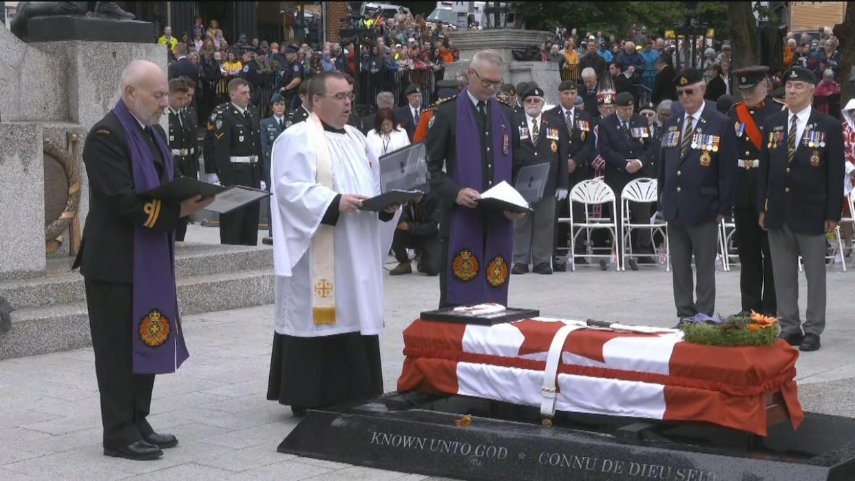 Canadian Armed Forces chaplain Lt.-Col. Shawn Samson delivers remarks at the entombment of Newfoundland's Unknown Soldier at the National War Memorial in St. John's.