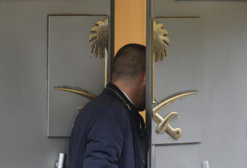 A man enters Saudi Arabia's consulate in Istanbul, Friday, Oct. 19, 2018. A Turkish official said Friday that investigators are looking into the possibility that the remains of missing Saudi journalist Jamal Khashoggi may have been taken to a forest in the outskirts of Istanbul or to another city — if and after he was killed inside the consulate earlier this month. (AP Photo/Lefteris Pitarakis)