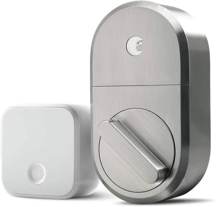 August Smart Lock + Connect Wi-Fi Bridge against white background.