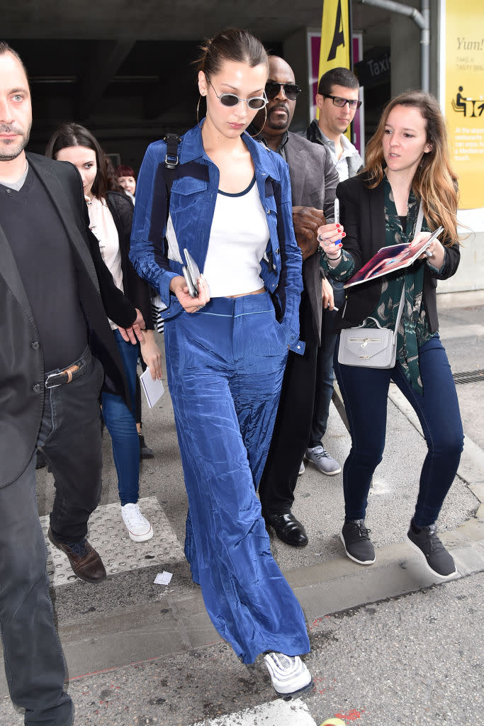 <p>Model Bella Hadid is seen during the 71st annual Cannes Film Festival at Nice Airport wearing a blue jacket and trouser set by Ovelia Transtoto in France on May 9, 2018. (Photo: Marc Piasecki/GC Images) </p>