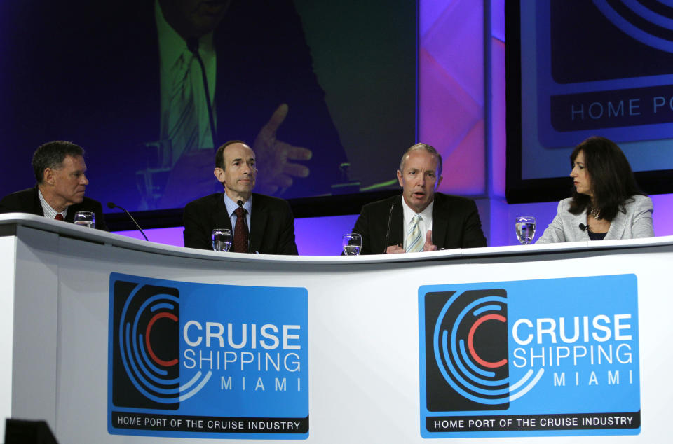 Daniel Hanrahan, President and CEO of Celebrity Cruises, second from right, speaks during a roundtable discussion on the state of the cruise ship industry at the Cruise Shipping Miami conference, Tuesday, March 13, 2012, in Miami Beach, Fla. Also shown are Gerald Cahill, President and CEO of Carnival Cruise Lines, left, Adam Goldstein, President and CEO of Royal Caribbean International, second from left, and Christine Duffy, President of Cruise Lines International Association, right. (AP Photo/Lynne Sladky)