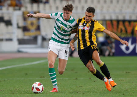 Soccer Football - Champions League - Third Qualifying Round Second Leg - AEK Athens v Celtic - Athens Olympic Stadium, Athens, Greece - August 14, 2018 Celtic's Jack Hendry in action with AEK Athens' Viktor Klonaridis REUTERS/Alkis Konstantinidis