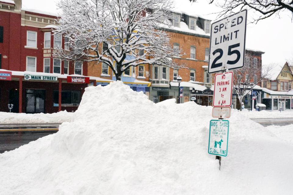 Snow piled up on the side of Main Street in Stroudsburg Borough in February, 2021 after a 48-hour snow storm hit the Poconos.