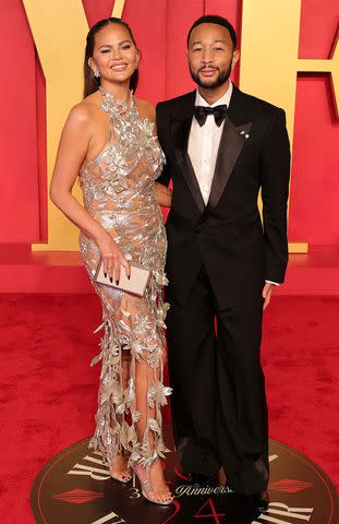 <p>Kayla Oaddams/FilmMagic</p> Chrissy Teigen and John Legend at the 2024 Vanity Fair Oscar Party