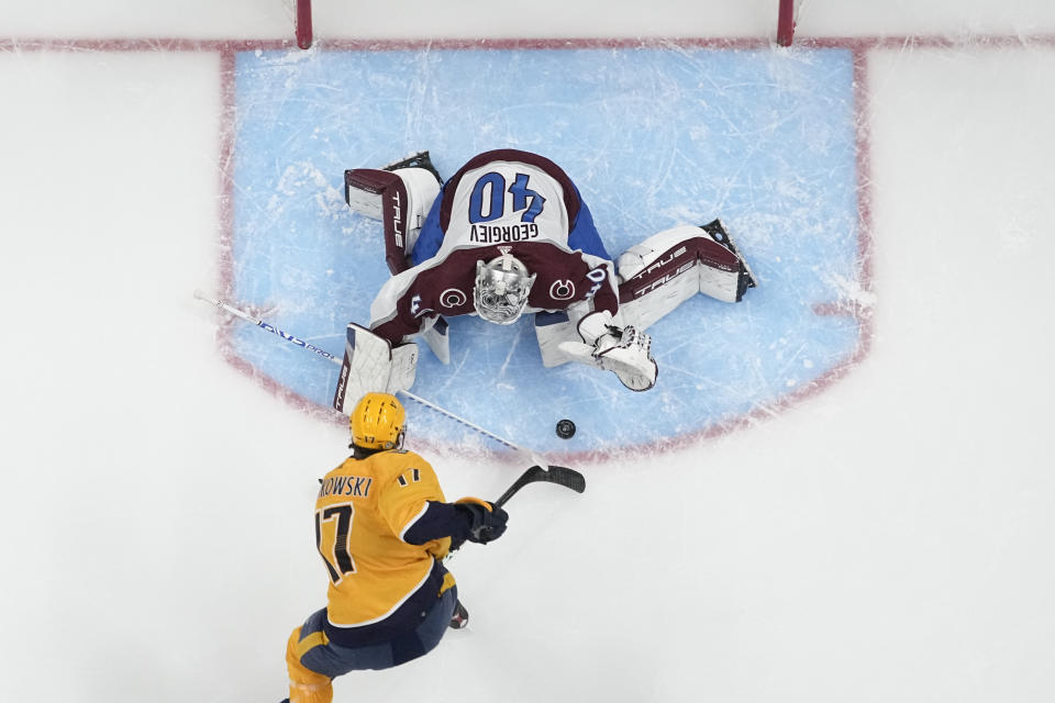 Colorado Avalanche goaltender Alexandar Georgiev (40) defends the goal against the Nashville Predators center Mark Jankowski (17) during the first period of an NHL hockey game Saturday, March 2, 2024, in Nashville, Tenn. (AP Photo/George Walker IV)