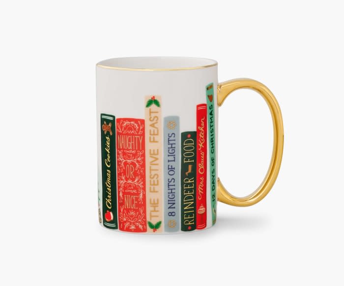 <p><a href="https://go.redirectingat.com?id=74968X1596630&url=https%3A%2F%2Friflepaperco.com%2Ffestive-book-club-porcelain-mug&sref=https%3A%2F%2Fwww.thepioneerwoman.com%2Fholidays-celebrations%2Fg41615916%2Fchristmas-mugs%2F" rel="nofollow noopener" target="_blank" data-ylk="slk:Shop Now;elm:context_link;itc:0;sec:content-canvas" class="link ">Shop Now</a></p><p>Holiday Porcelain Mug</p><p>riflepaperco.com</p><p>$15.40</p><span class="copyright">Rifle Paper Co.</span>