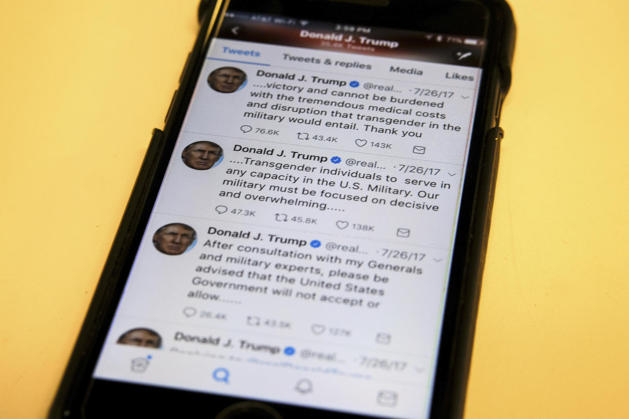 President Trump’s Twitter feed is photographed on a mobile phone. (Photo: J. David Ake/AP)