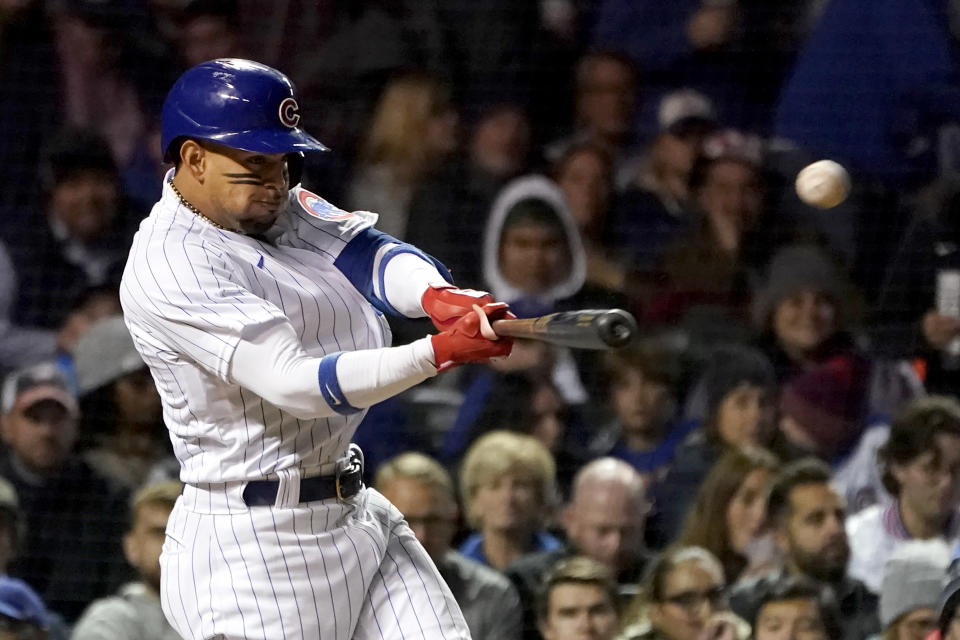 Chicago Cubs' Christopher Morel hits a three-run home run off Philadelphia Phillies starting pitcher Aaron Nola during the fifth inning of a baseball game Wednesday, Sept. 28, 2022, in Chicago. (AP Photo/Charles Rex Arbogast)