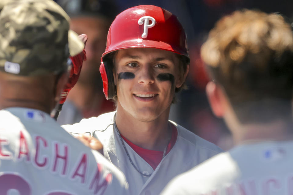 Philadelphia Phillies' Nick Maton is congratulated after hitting his first major league home run in the fifth inning of a baseball game against the Toronto Blue Jays Sunday, May 16, 2021, in Dunedin, Fla. (AP Photo/Mike Carlson)