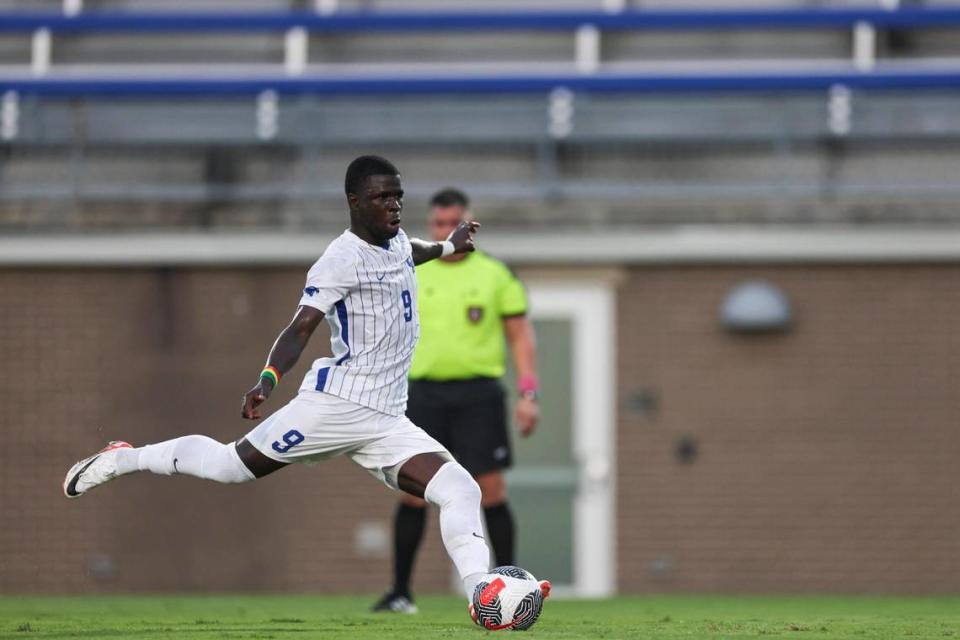 New Kentucky forward Aboubacar Camara, a transfer from Louisville, scores on a penalty kick against Florida Gulf Coast during UK’s season opener. The Wildcats visit Louisville on Tuesday night.