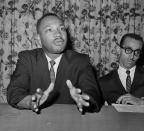 <p>Rev. Dr. Martin Luther King, Jr., of Atlanta, Ga., left, asked that Pres. John F. Kennedy issues an executive order declaring all forms of racial segregation illegal at a press conference, June 5, 1961, New York. He also said that a speaking trip to the South by the President would be welcomed by many White persons as well as African Americans. (AP Photo) </p>