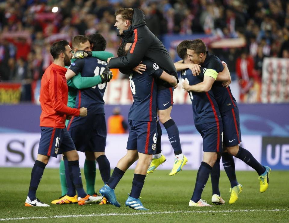 Football Soccer - Atletico Madrid v FC Barcelona - UEFA Champions League Quarter Final Second Leg - Vicente Calderon Stadium - 13/4/16 Atletico's Antoine Griezmann celebrates at the end of the game with team mates Reuters / Sergio Perez Livepic EDITORIAL USE ONLY.