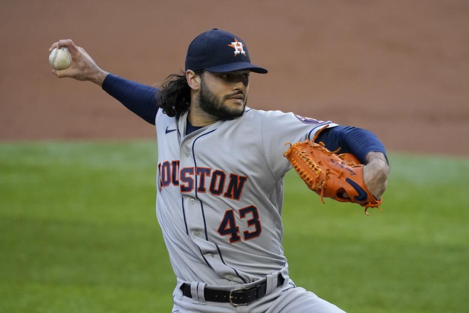 Houston Astros starting pitcher Lance McCullers Jr. throws to the Texas Rangers in the first inning of a baseball game in Arlington, Texas, Saturday, Sept. 26, 2020. (AP Photo/Tony Gutierrez)