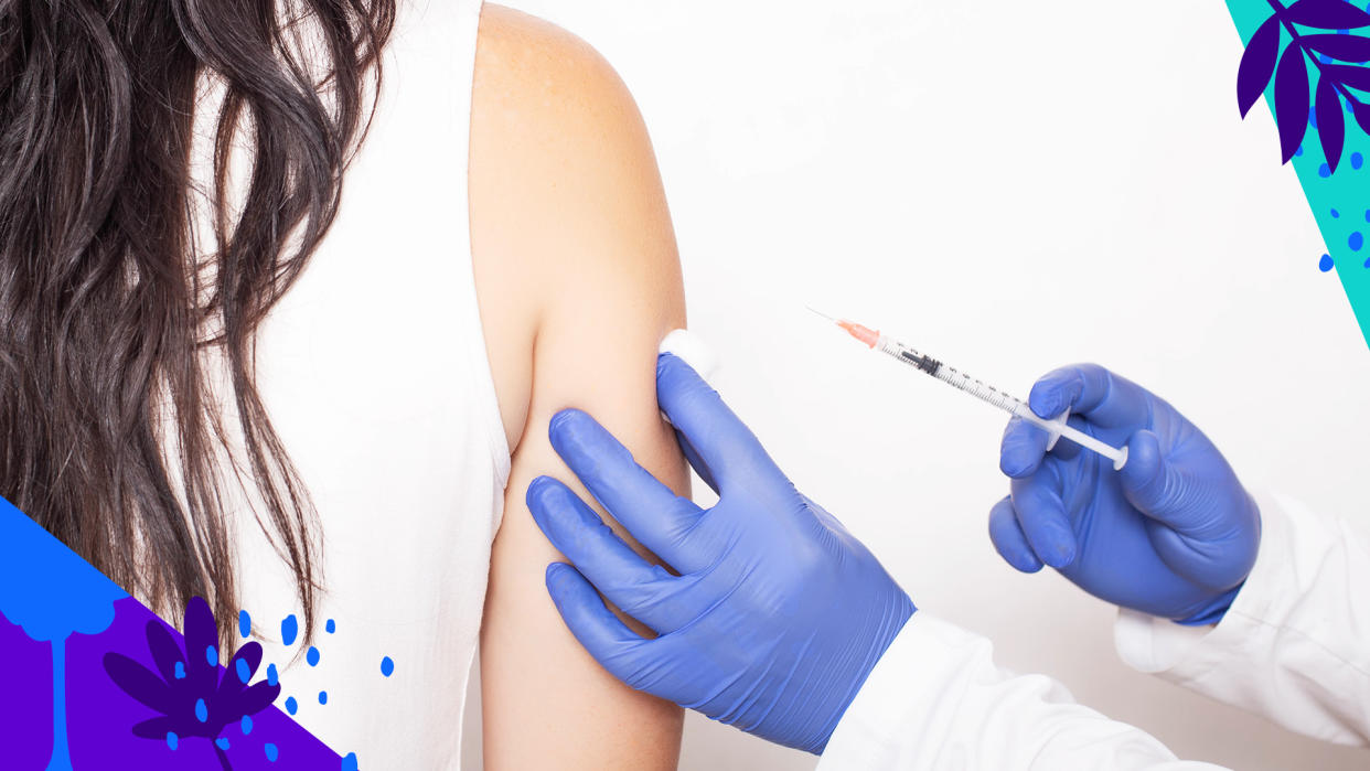 A medical technician prepares to give a woman a shot.