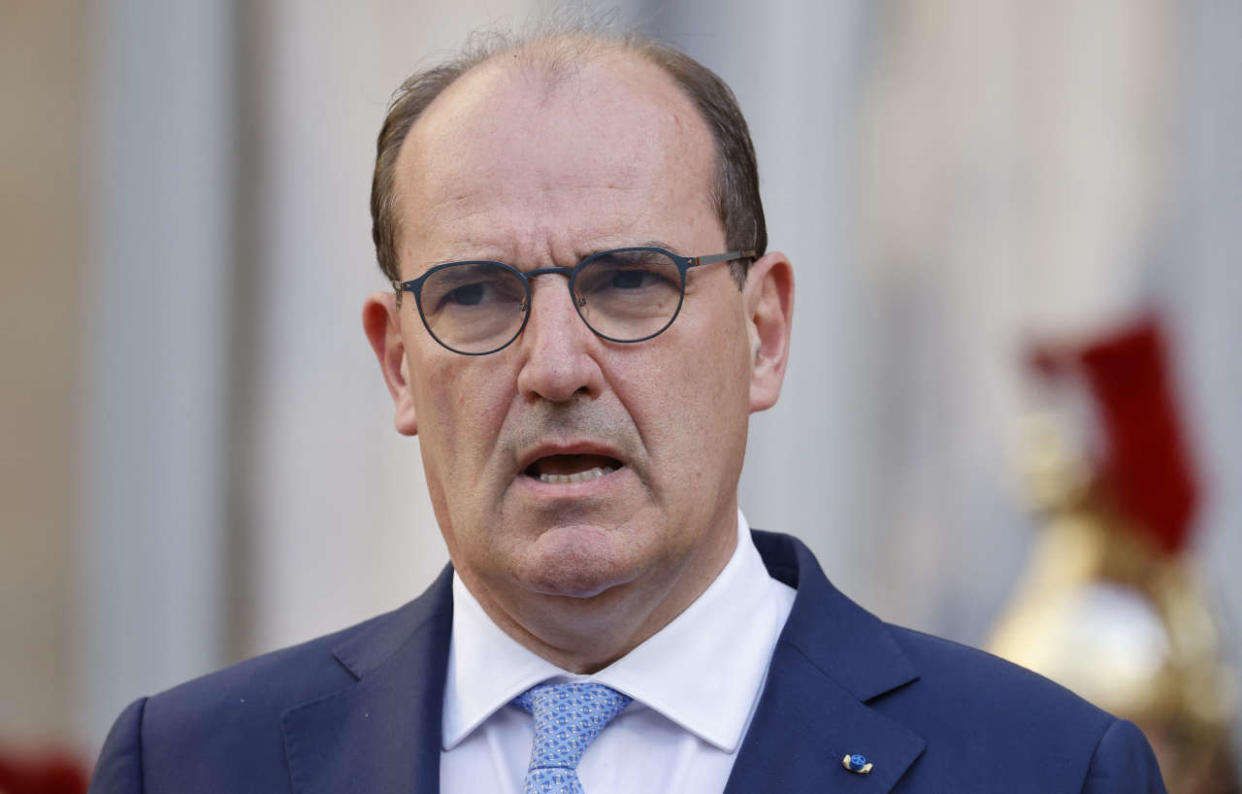 France's outgoing Prime Minister Jean Castex delivers a speech during a handover ceremony in the courtyard of the Hotel Matignon, French Prime ministers' official residence, in Paris on May 16, 2022. (Photo by Ludovic MARIN / various sources / AFP)