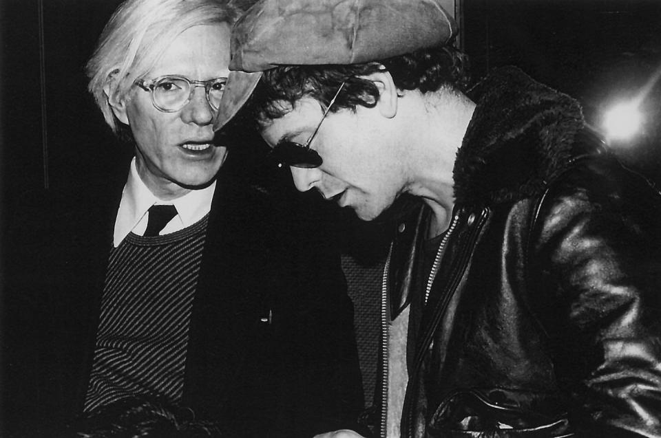 andy warhol talks to lou reed who has his head down
