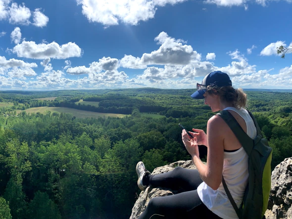 Julie Nolan on a hike near Collingwood, Ont. Census data shows the town is one of the fastest growing smaller urban centres in Canada, with many new residents, like Nolan, coming from the Greater Toronto Area. (Julie Nolan - image credit)