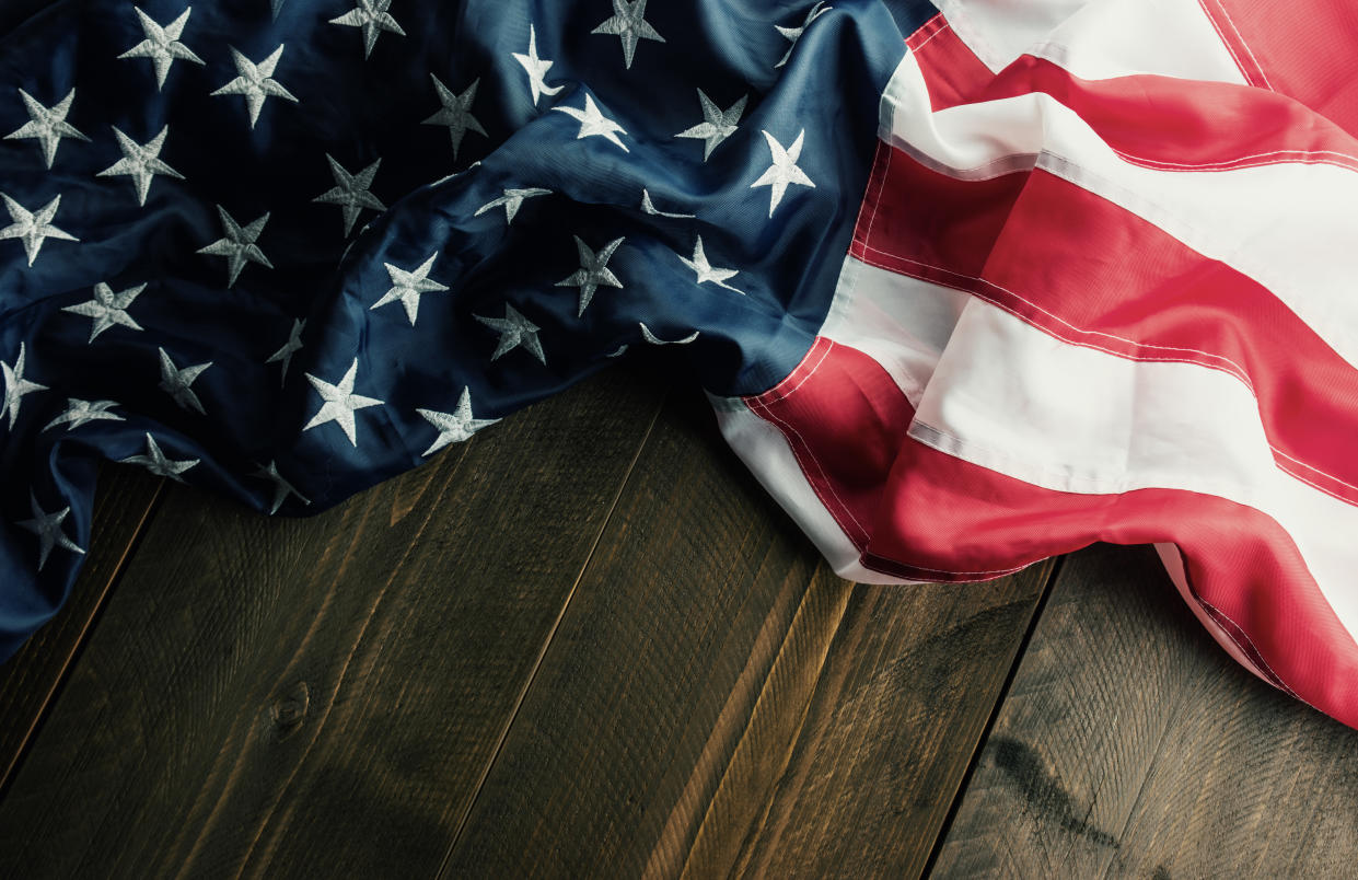 A 6th-grade boy at Lawton Chiles Middle Academy in Lakeland, Fla. was arrested after he refused to stand for the Pledge of Allegiance, claiming it was offensive to black people. (Photo: Getty Images)