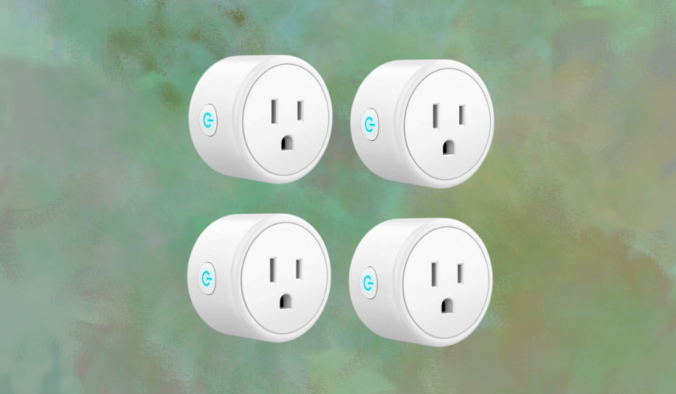 Four round white smart plugs with blue LED buttons on the side