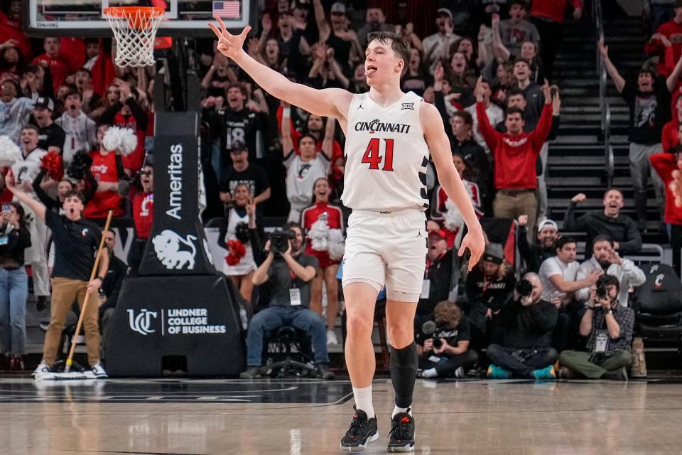 Guard Simas Lukosius  celebrates after hitting the go-ahead 3-pointer with just under 10 seconds remaining in the Bearcats 74-72 victory over Kansas State  Saturday night.