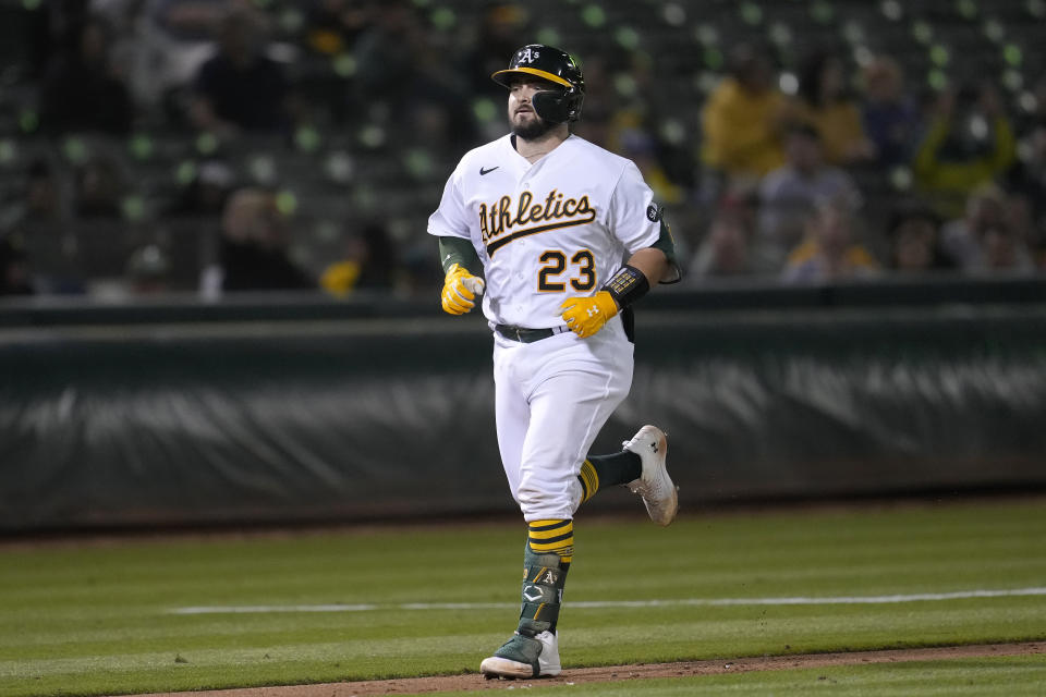 Oakland Athletics' Shea Langeliers jogs down the third base line after hitting a home run against the Kansas City Royals during the sixth inning of a baseball game in Oakland, Calif., Monday, Aug. 21, 2023. (AP Photo/Jeff Chiu)