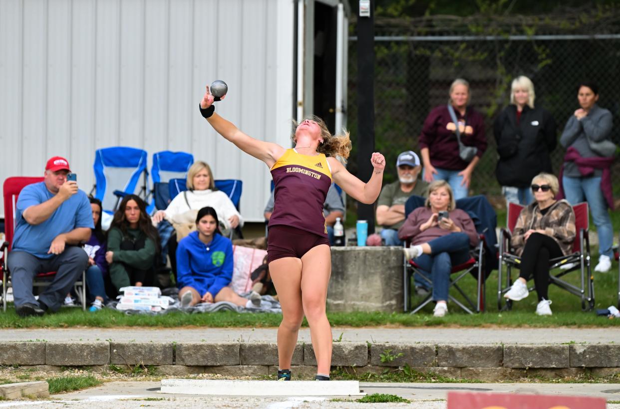 Bloomington North’s Hadley Lucas throws a school and meet record 54-10¾ in the girls' shot put during the Conference Indiana track meet at Bloomington North on Friday, April 26, 2024.